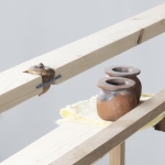 Care Structure | 42.5in x  41in x 38in | reclaimed wood, reclaimed clay, hand spun fiber reclaimed from discarded clothes, dyed cotton, goldenrod, aster, acorn, sumac